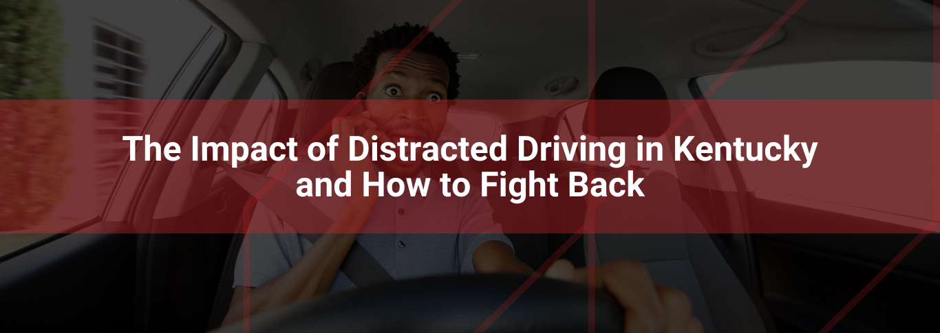 Person in car looking shocked while using a smartphone, highlighting the dangers of distracted driving in Kentucky.