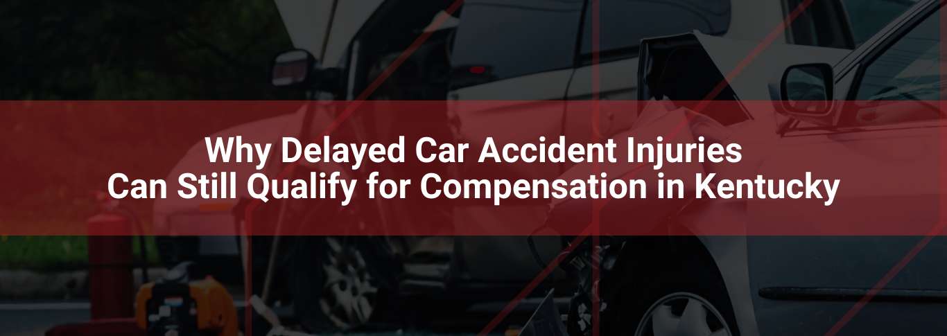 Car accident scene with damaged vehicles and emergency response equipment, highlighting delayed injury claims for compensation in Kentucky.