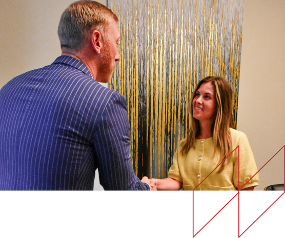 Professional consultation between a lawyer and a client in an office setting, emphasizing legal representation for bed bug infestation cases.